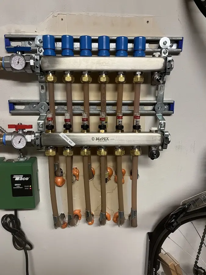 Plumber performing Water Heater Repair at a residential property in St. Joseph